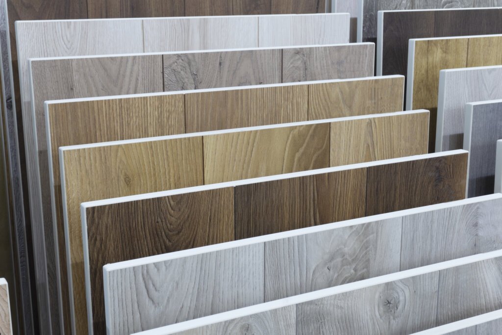 Laminate background. Samples of laminate or parquet with a pattern and wood texture for flooring and interior design. Production of wooden floors